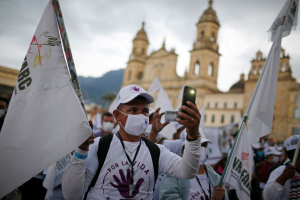 Former FARC combatants rally in Bogotá last year to demand security guarantees and compliance with the peace agreement signed with the government.